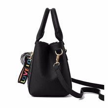 Load image into Gallery viewer, Women’s embroidered leather messenger bag with hairball accent - MELLIROSE